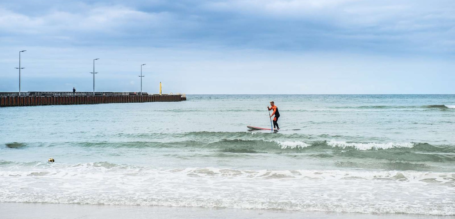Surfer ved Løkken Strand